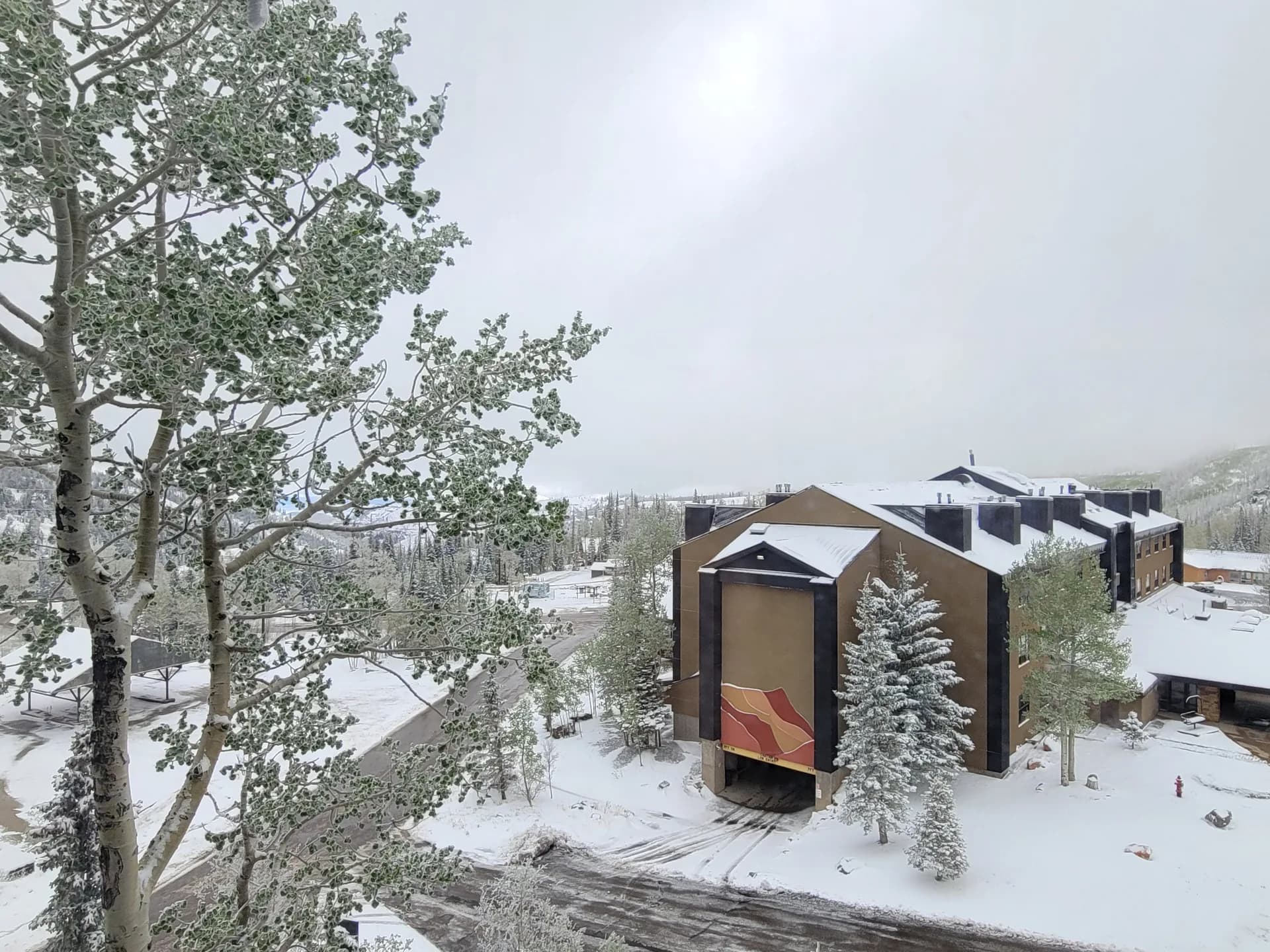Winter view of the lodge and snowy grounds at Brian Head